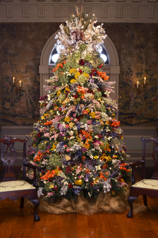 The famed Winterthur Dried Flower Tree's first appearance was in 1978, the same year of the first Yuletide at Winterthur. It has been part of Winterthur's Christmas theme ever since, with decorations that change every year. Many visitors come to Winterthur especially to see this tree. Image courtesy of Winterthur.